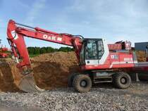 O&K MH 6 (Baujahr 1999, zul. Gesamtgewicht 22.000 kg, Leistung 134 kW) am 12.07.2015 in der Nähe von Trier-Föhren