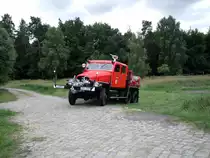 IFA G5 TLF15 aus Torgelow kommt von einer Ausfahrt zurück auf die Strasse.Foto 20.07.2015