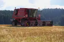 Das Tagwerk ist vollbracht! Mähdrescher Case Axial Flow 2366 hat Betriebspause in Unterlemnitz. 14.08.2013