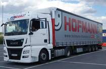 MAN TGX von  FITsped  steht abfahrbereit auf dem Rasthof Werneck, Juli 2015