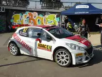Peugeot 208 T16 (Jonathan Hirschi / Vincent Landais) im Servicepark der Deutschland-Rallye, 23.08.2015