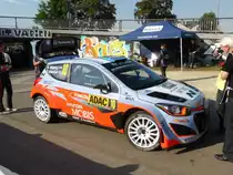 Hyundai i20 WRC (Kevin Abbring / Sebastian Marshall) im Servicepark der Deutschland-Rallye, 23.08.2015