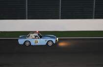 TRIUMPH TR4 im Regen, beim SPA SIX HOURS Classic 19.September 2015, Nachts vom Gebäude der Boxengasse. Blitzlicht ist erlaubt!