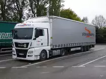MAN Sattelschlepper auf einem Autobahnparkplatz in Frankreich am 03.10.2015