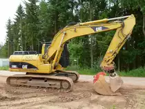 Caterpillar 318C L aufgenommen während der Bauarbeiten an der Umgehung von Merzig-Besseringen, 24.06.2012