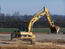 Caterpillar 324D LN arbeitet am 21.03.2009 auf einer Baustelle in der Nähe von Trier-Föhren