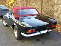 Heckansicht eines Fiat 124 Spider. 1966 - 1985. Besucherparkplatz der Düsseldorfer Classic Remise am 31.10.2015.