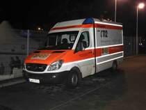 MB Sprinter als Rettungsdienstfahrzeug des ASB, gesehen an der BRITA-Arena in Wiesbaden im Dezember 2015