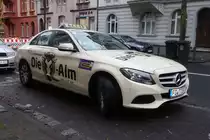 MB ist als Taxi Werbeträger für die  KUH-ALM  unterwegs in Fulda, Dezember 2015