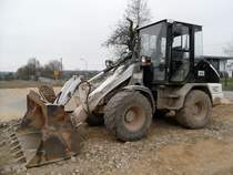 Caterpillar 906 am 14.03.2010 auf einer Baustelle bei Besch