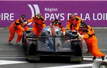 Nur noch einparken, Heckansicht des Ligier JSP2, Nissan VK45DE 4.5L V8, vom Team G-Drive . 9er nach 354 Runden 2014 beim 24h Rennen in Le Mans, Fahrer: Alex Brundle (GB), Jann Mardenborough (GB) & Mark Schulschizki (Rus).