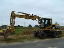Caterpillar M 315 auf einer Baustelle in der Nähe von Arlon (B), 02.09.2007