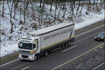 MITZIEHER Nr.2: Ein DAF XF95.430 von GEORGI TRANSPORTE AIRCARGO SERVICE hat vermutlich Luftfracht geladen oder ist in Richtung Dortmunder Flughafen unterwegs. (11.12.2008)
