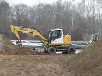 Liebherr Bagger am 17.12.16 in Mainz von einen Gehweg aus fotografiert