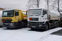 MAN TGA 26.390 und Mercedes Actros 1841 eines Heizöllieferanten in Viechtach. Fotografiert vom offenen Werkstor aus. 03.01.2016
