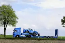 DAF Tieflader des Baumaschinenverleih Collé Rental & Sales beladen mit einem  Manitou MT 932. Mitzieher vom 26.4.2017 auf der L 164 (ex B221) bei Übach - Palenberg