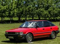 Toyota Corolla E90, fotografiert auf der XII. Lotus Retro Mobil Concours d´Elegance im Urpark des Lotus Hotels, Juni, 2017.