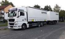 MAN TGX 26.440, LKW mit Tandem-Hänger in Helmstedt am 17.07.2017.