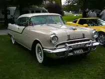 Pontiac Series 27 Star Chief Catalina Hardtop Coupe des Modelljahres 1956. Die Starchief Modelle mit dem Namenszusatz Catalina haben keine B-Säule. Von dieser Karosserie- und Ausstattungsvariante verkaufte die GM-Tochter Pontiac 1956 43392 Fahrzeuge. Der Grundpreis lag bei US$ 2661,00. Der V8-motor hat einen Hubraum von 5186 cm³ und leistet 192 PS. 
14. US-Cartreffen am 29.07.2017 im CentroO.