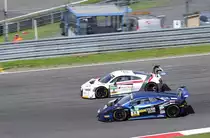Zweikampf #66 Lamborghini Huracán GT3 und #8 Audi R8 LMS wärend dem Samstagsrennen auf dem Nürburgring, ADAC GT Masters