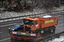 MAN 19.364 der AM Ldenscheid rumt die Fahrbahn vom Schneematsch. Gru an die Kollegen. (23.01.2009)
