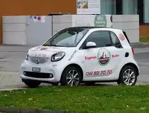 Weisser Smart mit Werbung in Prattelen am 20.11.2017