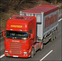 Scania R500 8/ von HAUSER ist mit einem Container mit der Aufschrift THNI bei Ldenscheid in Richtung Sden unterwegs. HAUSER Transporte wurde im Jahr 1994 mit nur einem Lkw gegrndet. Im Jahr 2007 wurde eine Zweitfirma  Hauser Bulgaria  mit Sitz in Plovdiv gegrndet und im Jahr 2008 waren 26 Lkw´s fr Hauser/sterreich und 8 Lkws fr Hauser/Bulgaria unterwegs. Aufllig ist das alle Lkw´s zwischen 500 und 620 PS besitzen!!