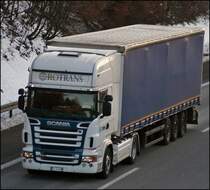 Scania R580 \8/ der italinischen Spedition RoTrans ist am Abend des 29.01.2009 in Richtung Ruhrgebiet unterwegs.
