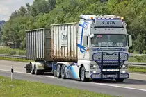 MAN TGX als Tandemzug mit Abrollcontainern unterwegs auf der A44 Richtung Dortmund. Zierenberg 08.08.2012 ( Bild von einem Parkplatz aus gemacht )