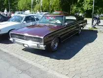 Dodge Charger des Modelljahres 1966/1967. Der Kunde konnte zwischen vier V8-motorisierungen wählen: 5211 cm³ und 230 PS, 6276 cm³ und 325 PS, 6980 cm³ und 425 PS, sowie dem neuen HEMI 440 Magnum Motor mit 7210 cm³ und 375 PS. An der Westküste der USA war ein solcher Charger ab US$ 3482,00 zu haben. Prinz-Friedrich Oldtimertreffen am 06.05.2018 in Essen-Kuperdreh.