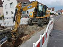 Kropp Bau CAT M320F Bagger am 16.05.18 in Maintal Bischofsheim 