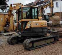 =Ammann Yanmar Vio 75 steht auf einer Baustelle in Taunusstein-Wehen im Mai 2016