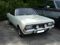Opel Commodore A GS Coupe. 1967 - 1971. Im Februar 1967 startete Opel die neue Modellreihe Commodore, basierend auf dem Rekord C. Der Wagen gewann rasch Anerkennung als preisgünstiges Auto für gehobene Ansprüche. Der 6-Zylinderreihenmotor hat einen Hubraum von 2490 cm³ und leistet 130 PS. Damit erreicht er eine Höchstgeschwindigkeit von 180 km/h. Oldtimertreffen Nordsternpark Gelsenkirchen am 24.06.2018.