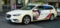 =Opel als Taxi wartet auf neue Kunden im Juli 2018