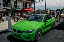 Grüner BMW M4 Coupé. Aufnahmezeit: 02.06.2018.