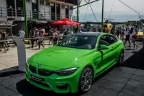 Grüner BMW M4 Coupé. Aufnahmezeit: 02.06.2018.