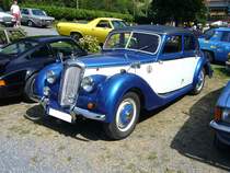 Riley RM Saloon. 1946 - 1953. Die Riley-Gruppe ging im Jahr 1953 in der B ritish M otor C orporation auf. Der abgelichtete Wagen entstammt dem Baujahr 1947 und hat einen 4-Zylinderreihenmotor mit einem Hubraum von 2443 cm³, der 90 PS leistet. Oldtimertreffen  Schwarzwaldhaus  in Mettmann am 12.08.2018.