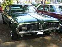 Mercury Cougar des Modelljahres 1967 im Farbton inverness green. Im Grunde war der Cougar eine luxuriösere Version, des bereits zwei Jahre zuvor vorgestellten Ford Mustang. Der Cougar war wahlweise mit zwei V8-motoren lieferbar: 4735 cm³ mit 200 PS oder 6384 cm³ mit 324 PS. 10. Dukes of Downtown am 01.09.2018 in Essen-Rüttenscheid.