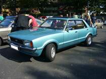 Ford Taunus TC2 1.6GL viertürige Limousine (Werksintern GBFS genannt). Der TC2 wurde 1976 als Nachfolger des  Knudsen  Taunus vorgestellt. Der abgelichtete Wagen entstammt dem Modelljahr 1979 und ist somit dem ersten Baujahr des  Facelift -Taunus zuzuordnen. Für eine solche viertürige Limousine mit dieser Motorisierung musste man mindestens DM 15.200,00 auf die Theke des Ford-Händlers legen. Der Vierzylinderreihenmotor hat einen Hubraum von 1593 cm³ und leistet wahlweise 68 PS oder 72 PS. 4. Ford Event am 02.09.2018 in Krefeld. 
