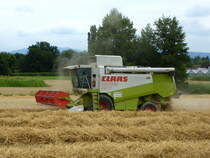 Mähdrescher Claas Lexion 450 bei der Getreideernte, Juli 2018