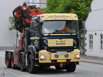 Ein MAN TGA 35.440 in den Straßen von Aalborg. (Juni 2018)