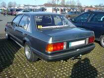 Heckansicht einer Opel Rekord E2 Limousine. 1982 - 1986. Besucherparkplatz der Zentralhallen Hamm am 23.02.2019.