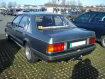 Heckansicht einer Opel Rekord E2 Limousine. 1982 - 1986. Besucherparkplatz der Zentralhallen Hamm am 23.02.2019.