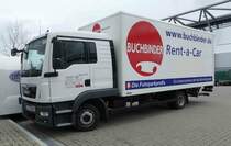 =MAN TGX des Autovermieters BUCHBINDER steht auf dem Messegelände in Stuttgart anl. Retro Classic, 03-2019