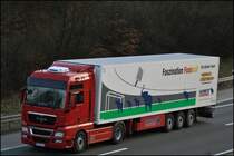 MAN TGX 18.440 mit Schmitz Cargobull K�hlauflieger der Georg K�sters Transporte. (03.03.2009)
