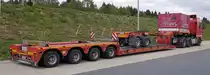 =MAN TGX-Schwerlastsattelzug steht auf einem Rastplatz an der A 7 im Mai 2019