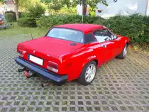 Heckansicht eines Triumph TR7 Coupe im Farbton pimento red. Mülheim an der Ruhr am 22.02.2019.