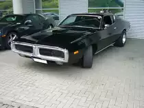 Dodge Charger des Modelljahres 1972. Als reines  Muscle car  stellte Dodge 1966 das Coupemodell Charger vor. Ab dem Modelljahr 1972 wagte man bei Dodge den Schritt zum luxuriöseren, aber trotzdem stark motorisierten Coupe. Auch hier konnte der Interessent unter etlichen Motorisierungen zwischen 112 PS aus einem Sechszylinderreihenmotor mit einem Hubraum von 3678 cm³ und etlichen V8-Motoren mit bis zu 7206 cm³ Hubraum und 335 PS wählen. US-Cartreffen CentroO am 21.07.2019.