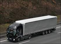 Dieser slowakische Iveco Stralis 500PS Euro5  ALL BLACKS  fhrt bei Ldenscheid die Homert in Richtung Sden hinauf. Der Motor ist ein Cursor 13 mit 12,9 l Hubraum. (11.03.2009)