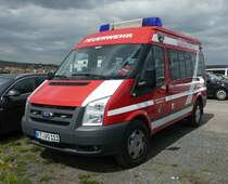 =Ford Transit der Feuerwehr VOLKACH, steht auf dem Besucherparkplatz der Rettmobil 2019 in Fulda, 05-2019